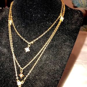 layer, layer, layer gold necklaces Stars